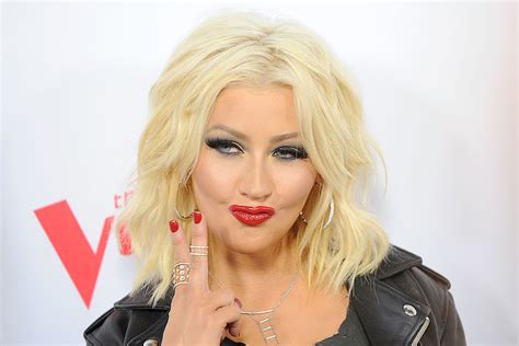 Christina Aguilera poses topless for 41st birthday photos